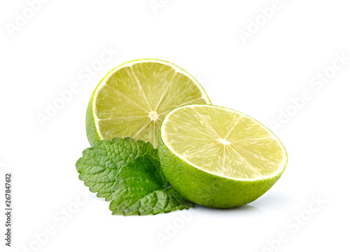 Melissa leafs with lime isolated on white background