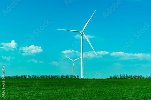 wind turbines in green field