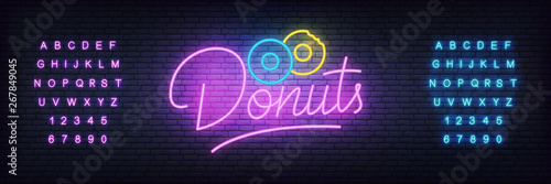 Donuts neon template. Glowing lettering donuts sign for bar, cafe, restaurant.