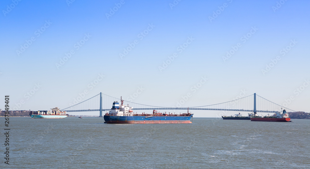 Boat movement at the entrance to the Port of New York with the Verrazzano-Narrows bridge