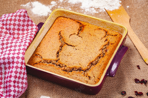 Homemade semolina cake on sackcloth background. Close up