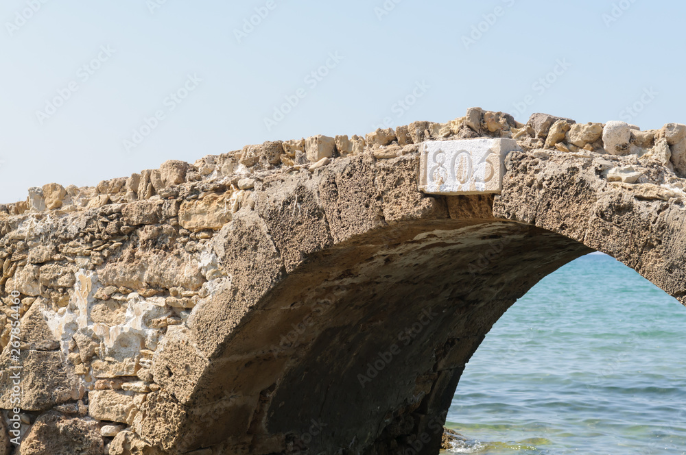 Stone bridge on a beach at Argassi, Zakynthos, Greece