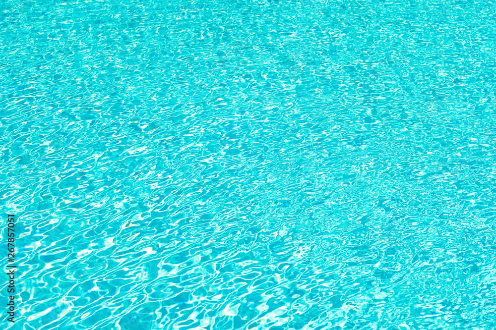 Total relaxation. swimming pool rippled water. sea water background. blue water waves. malibu beach life. underwater ocean. miami paradise resort. summer vacation. luxury hotel pool. sea background