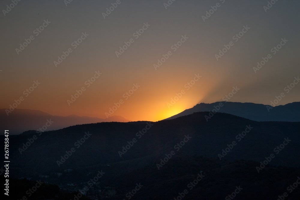 Sunset in the mountains. Nature landscape sunset background