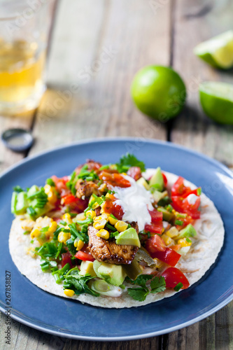 Soft tacos with fillet steak, sweetcorn, coleslaw, avocado and tomato salsa
