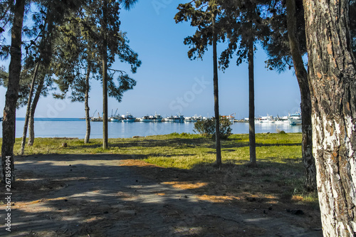 NEA MOUDANIA, GREECE - MARCH 31, 2019: View from Coastal street of town of Nea Moudania, Chalkidiki, Central Macedonia, Greece photo