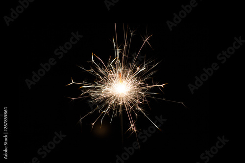 Burning sparklers, happy New Year