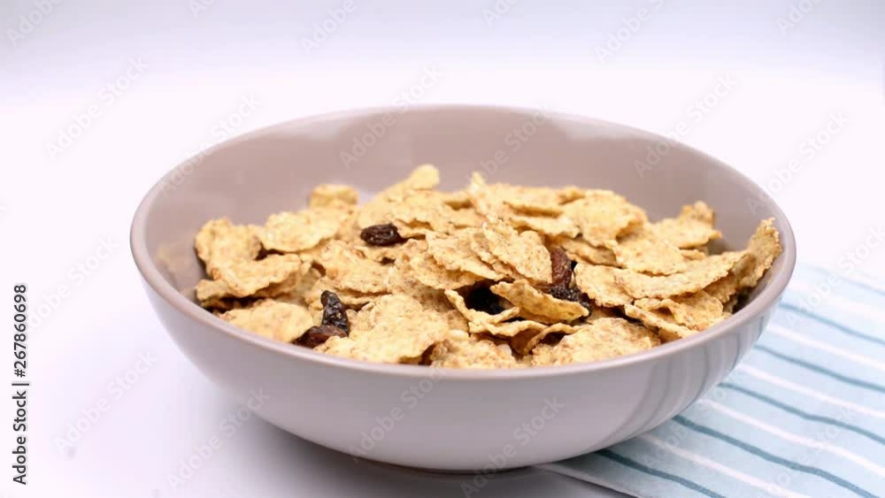 dry breakfast cereal healthy food for a diet pour in drops in a plate dry breakfast cereal healthy food for a diet pour in drops in a plate