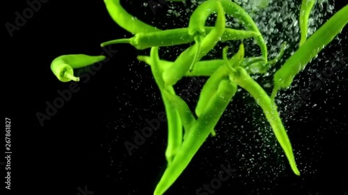 green pepper under the water with bubble