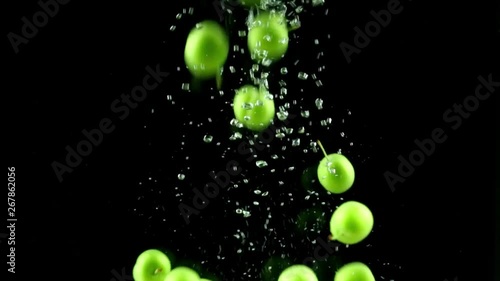 green plum splash underwater