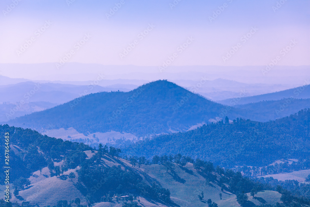 Evening haze over forested hills and mountains in Victoria, Australia