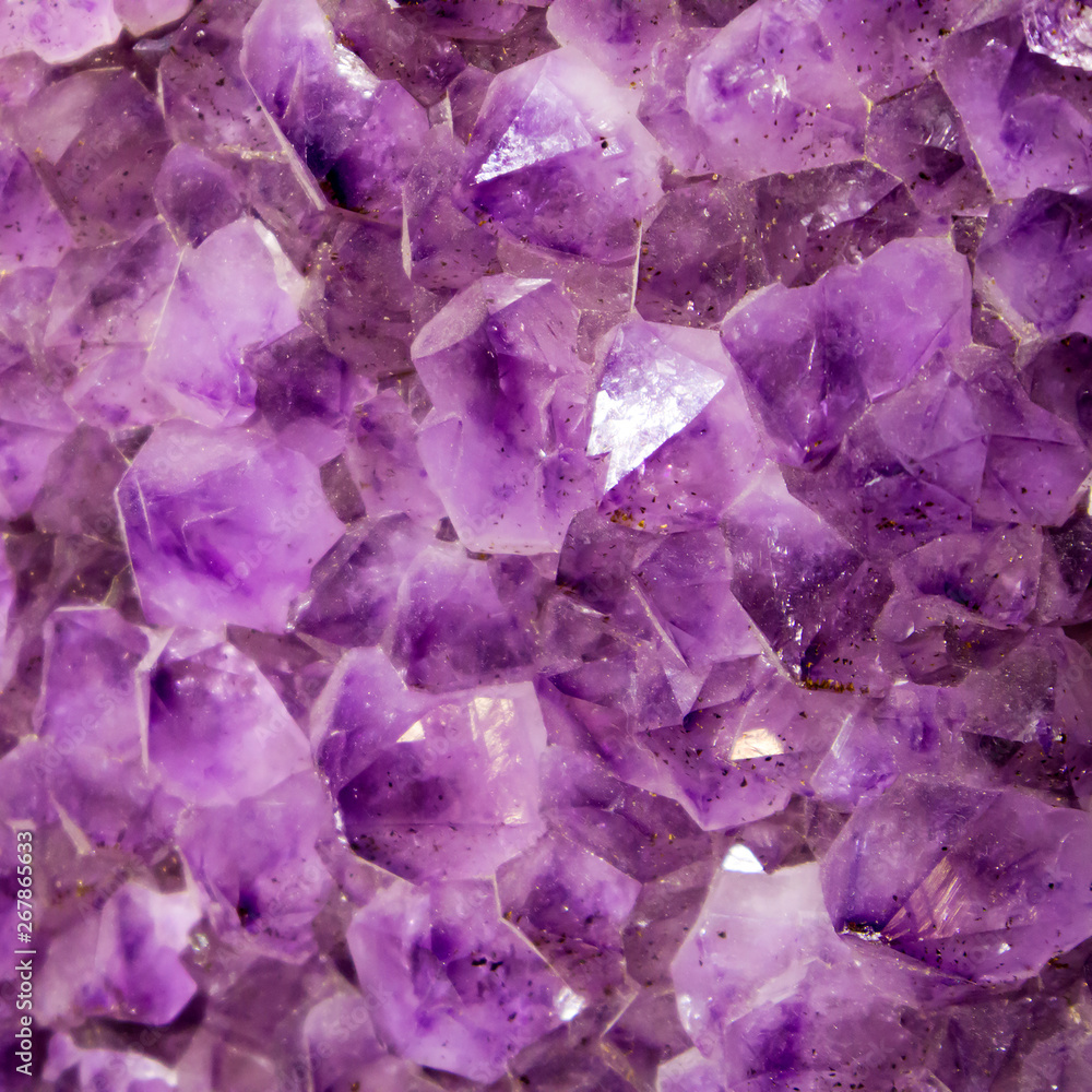 Large piece of living raw amethyst at the minerals exhibition close up Large piece of living raw amethyst at the minerals exhibition close up
