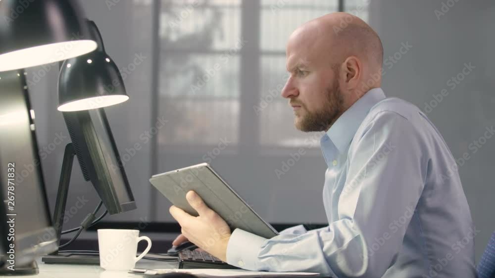 Male professional working at his desk Male professional working at his desk