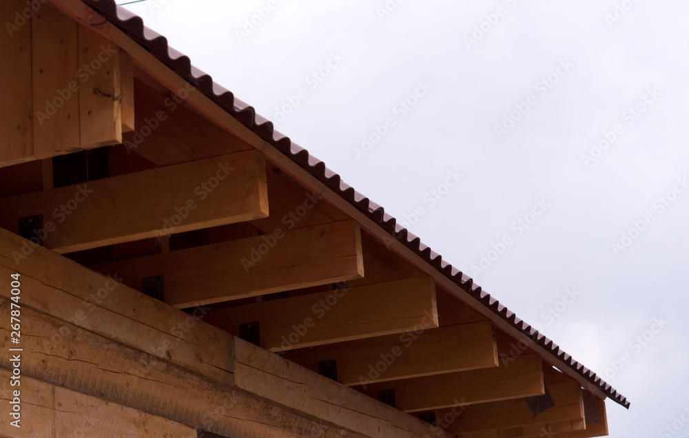 Roof of a house under construction close up, shallow depth of field Roof of a house under construction close up, shallow depth of field