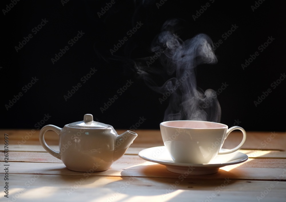 Cup of Tea with Hot Smoke and Lit Candle. on the Desk at Home, Power Outage  (focus on Cup). Stock Photo - Image of flame, evening: 233286940
