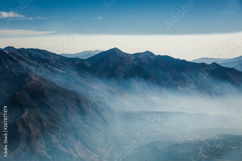 Aerial View of a California Mountain Wildfire Smoke from Above