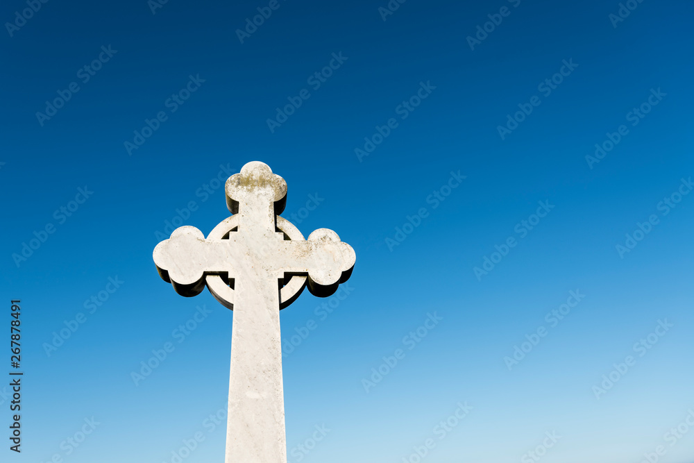 Cross against blue sky background