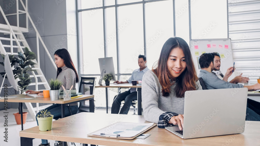 Group of diversity creative designer working at modern office building.casual office lifestyle with technology Group of diversity creative designer working at modern office building.casual office lifestyle with technology
