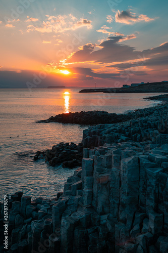 Sunset over basalt columns in Iceland