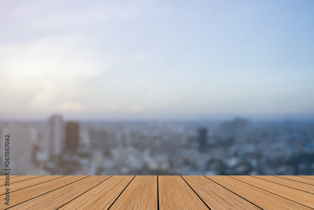 abstract blurred modern industry and business building exterior downtown of capital city panoramic background with wooden tabletop for show,promote,ad product on display concept	