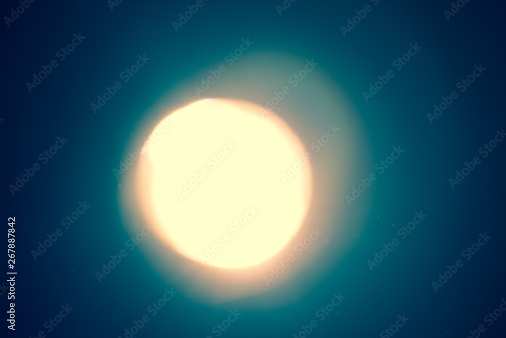 Ray of lamp spot lens light over black background, square stage abstract illumination Ray of lamp spot lens light over black background, square stage abstract illumination