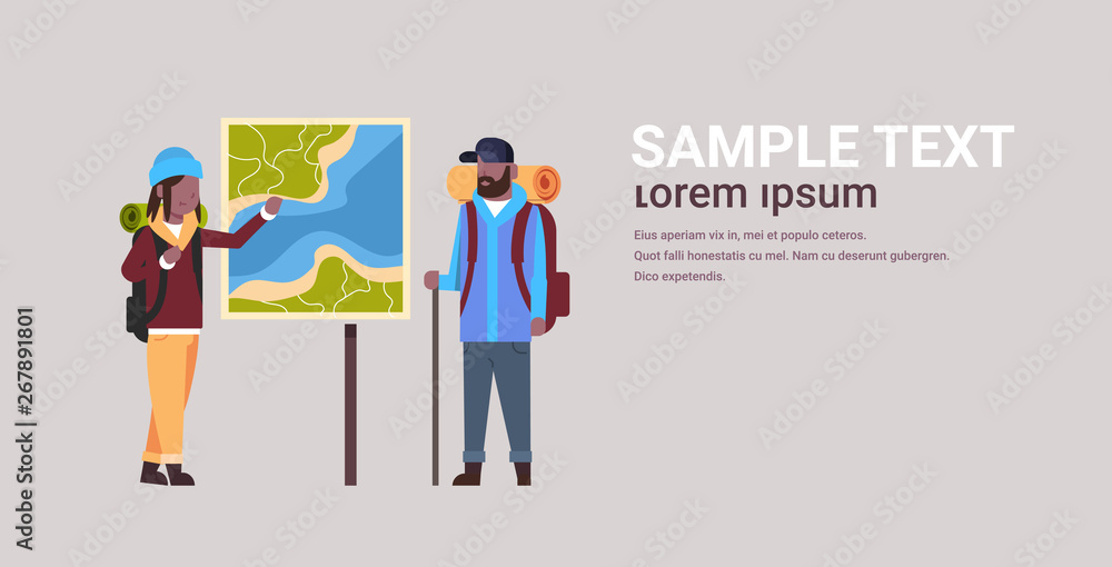 couple of tourists hikers with backpacks looking at travel map african american man woman planning the route hiking concept travelers on hike horizontal full length copy space flat