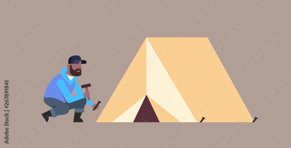 Fototapeta premium man hiker camper installing a tent preparing for camping hiking concept african american traveler on hike horizontal male cartoon character full length flat