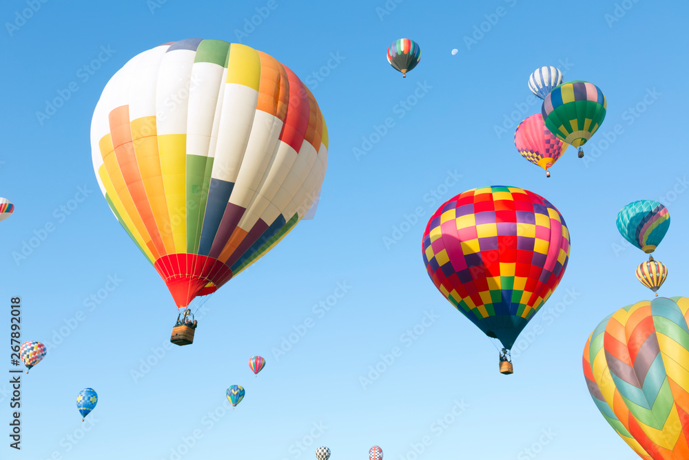 Multi colored hot air balloons in the sky Multi colored hot air balloons in the sky