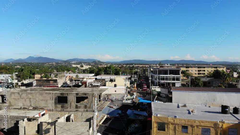 Aerial video of downtown Santo Domingo in the Dominican Republic. Clear sky's and nice palm trees.