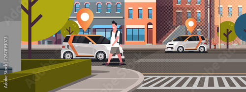 cars with location pin on road online ordering taxi car sharing concept mobile transportation man using carsharing service modern city street cityscape background flat horizontal