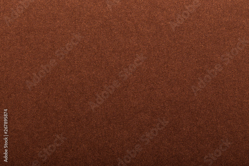 Texture of dark paper. Background for images. copyspace. space for text. sheet of gray craft paper as background. brown paper