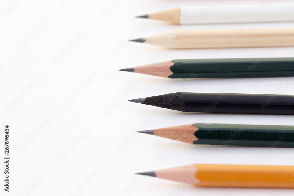 Background with white paper and pencils. Workplace for the artist and ...