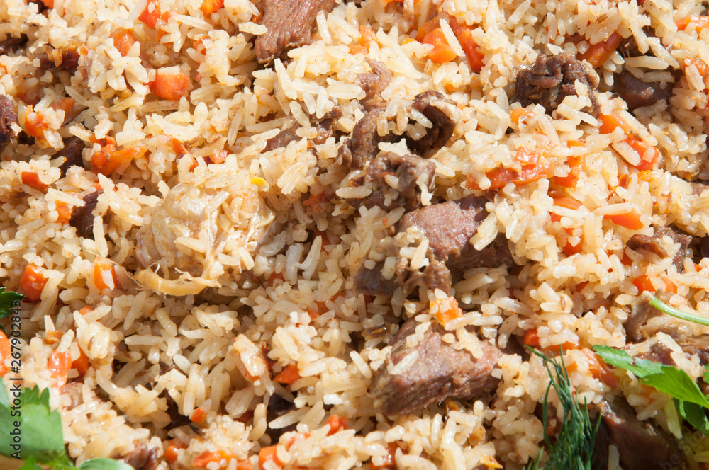 Uzbek pilaf in the market. Picnic with uzbek pilaf Uzbek pilaf in the market. Picnic with uzbek pilaf