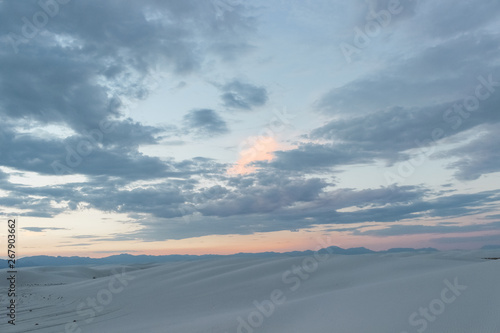 pastel colored desert sunset above white sand dunes in White Sands National Park, New Mexico