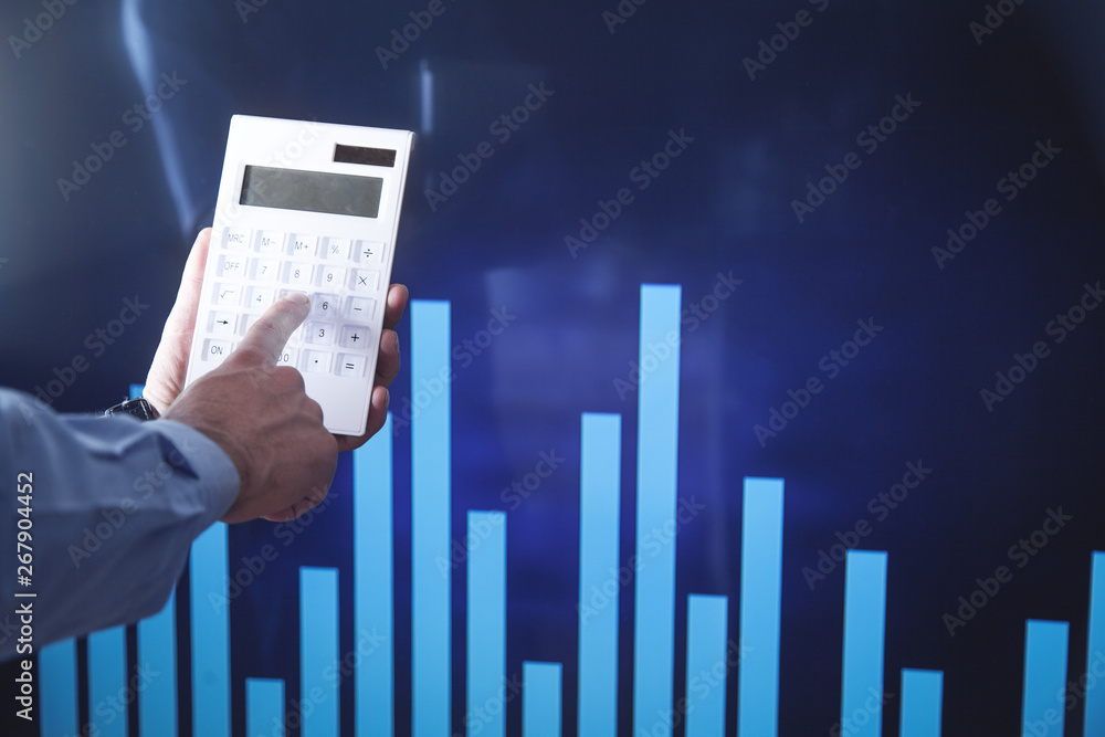 Investor with calculator. Business concept Investor with calculator. Business concept