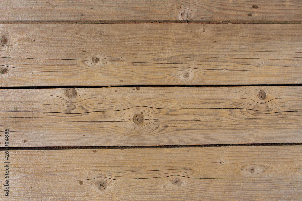 Wooden natural texture. Brown wooden planks background. Wooden natural texture. Brown wooden planks background.