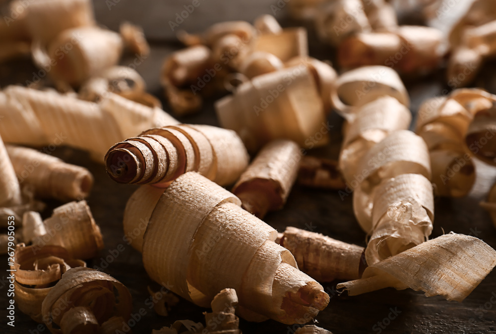 Curled wood shavings on table, closeup Curled wood shavings on table, closeup