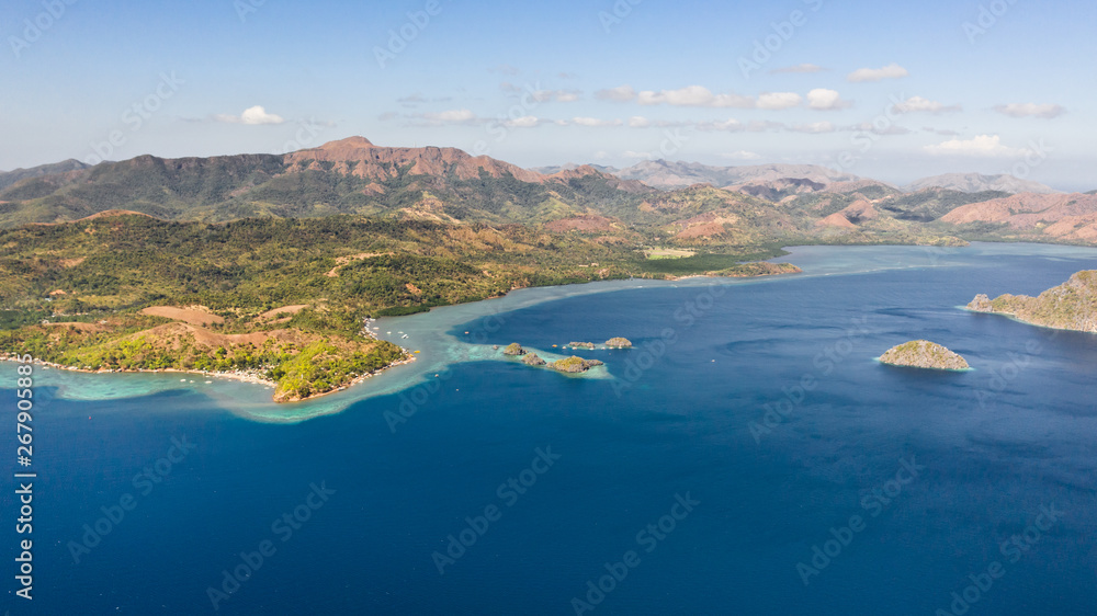Seascape in the Philippines. Sea coast with mountains and islands aerial view. Philippines, Palawan