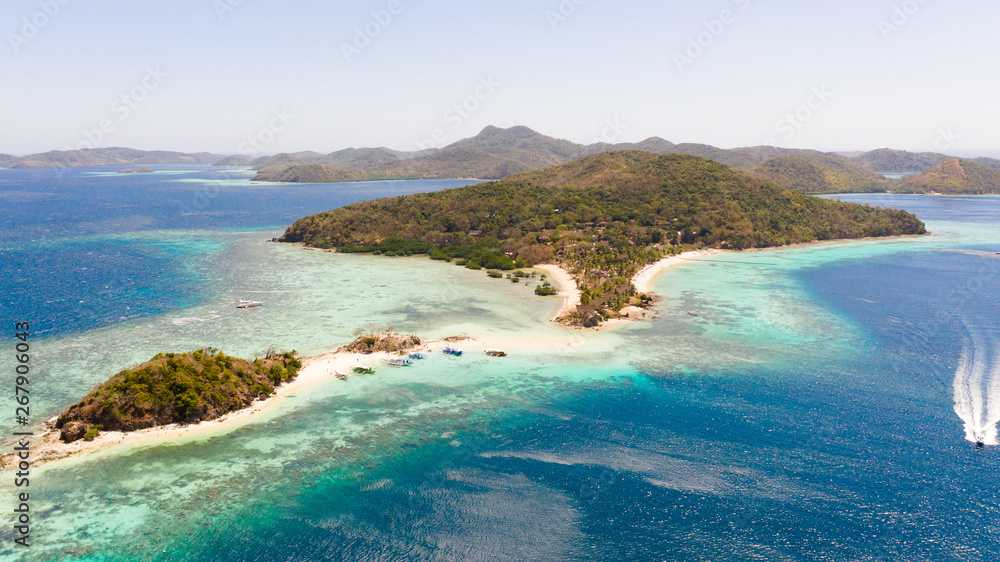 Tropical islands with white beaches. Turquoise lagoon and coral reefs, top view. Philippines, Palawan