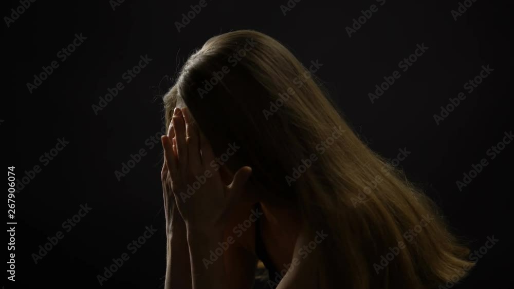 Tired woman massaging head and nose, lack of sleep, insomnia problems, close-up Tired woman massaging head and nose, lack of sleep, insomnia problems, close-up