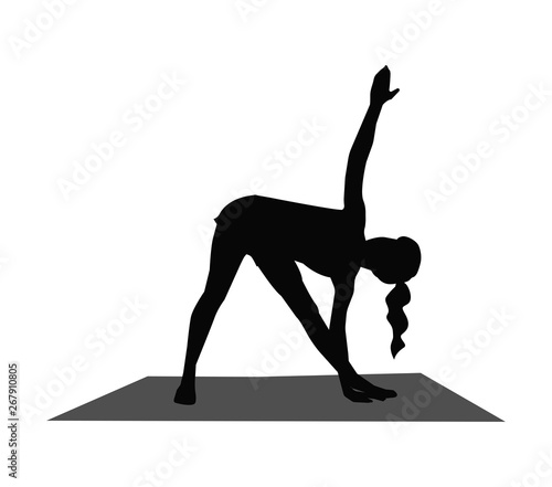 silhouette of a woman doing yoga