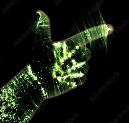 Glowing kirlian aura photography with green corona of a male human hand photo