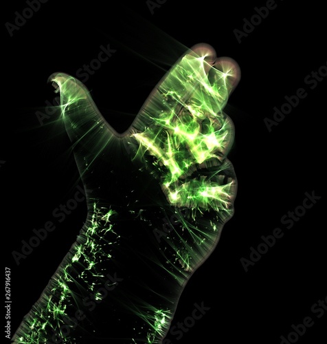 Glowing kirlian aura photography with green corona of a male human hand photo