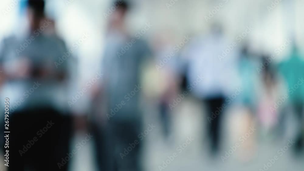 Blurred passenger walking on the walkway Blurred passenger walking on the walkway