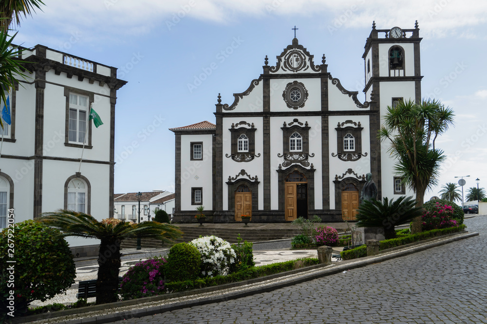 Church tower with bells and clock on Sao Miguel Island in Azores, Portugal.