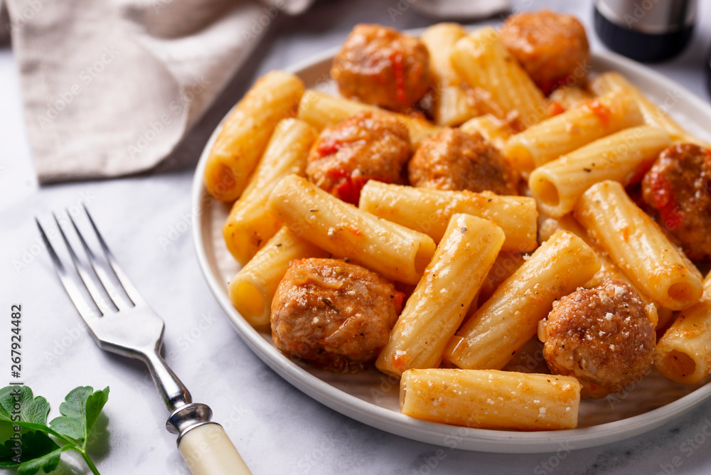 Pasta with meatballs in tomato sauce. Pasta with meatballs in tomato sauce.