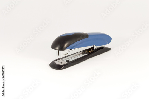 Black and blue stapler isolated on a white background