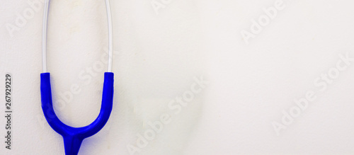Blue Stethoscope or ear pieces of doctor for examination on closed up part details