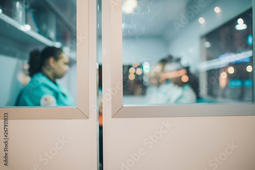 Door of the emergency ambulance car. Defocused blur background