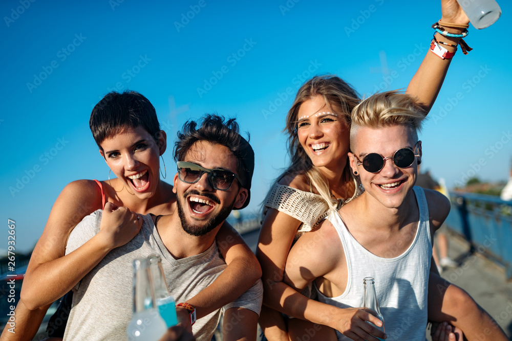 Group of young friends having fun together - obrazy, fototapety, plakaty 